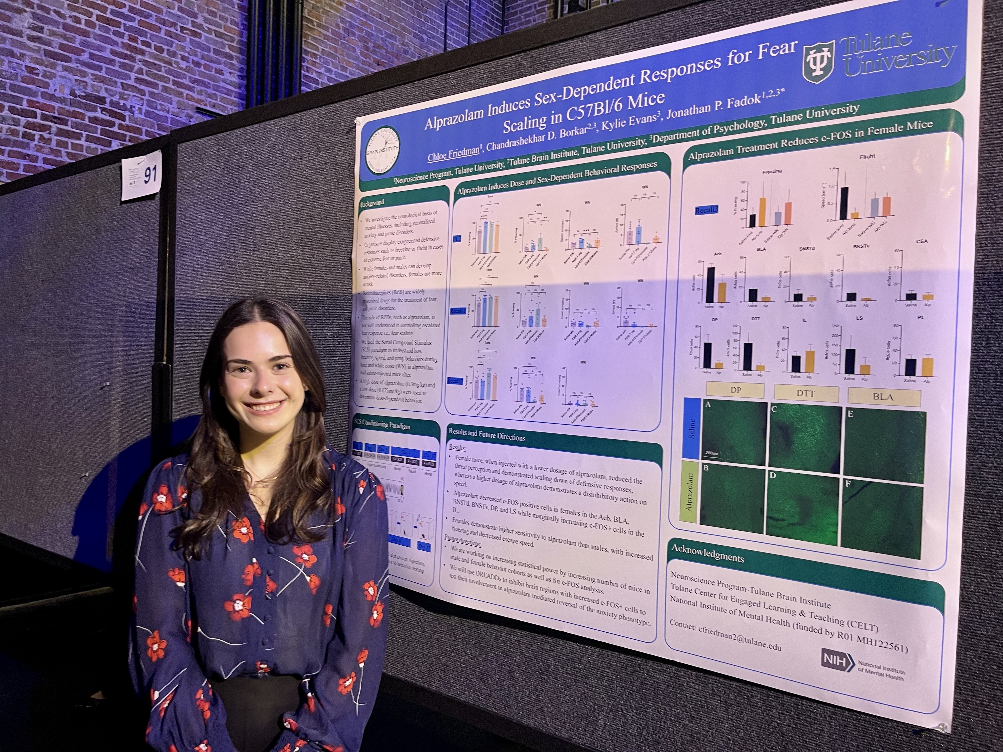 Chloe Friedman standing next to her poster