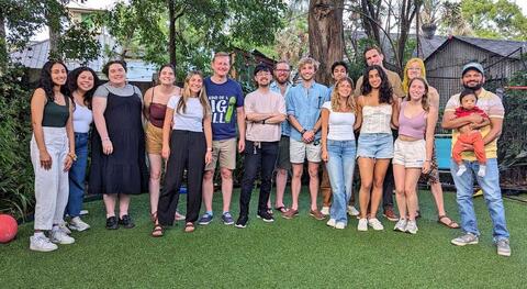The lab members hanging out at the lab BBQ