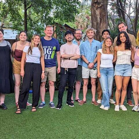 The lab members hanging out at the lab BBQ